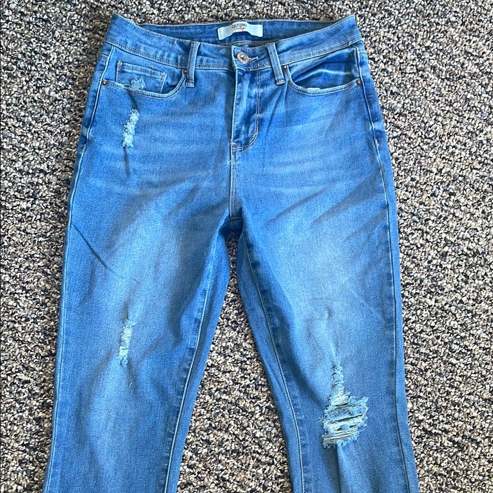 Blue Skinny Jeans with Distressed Knee Details